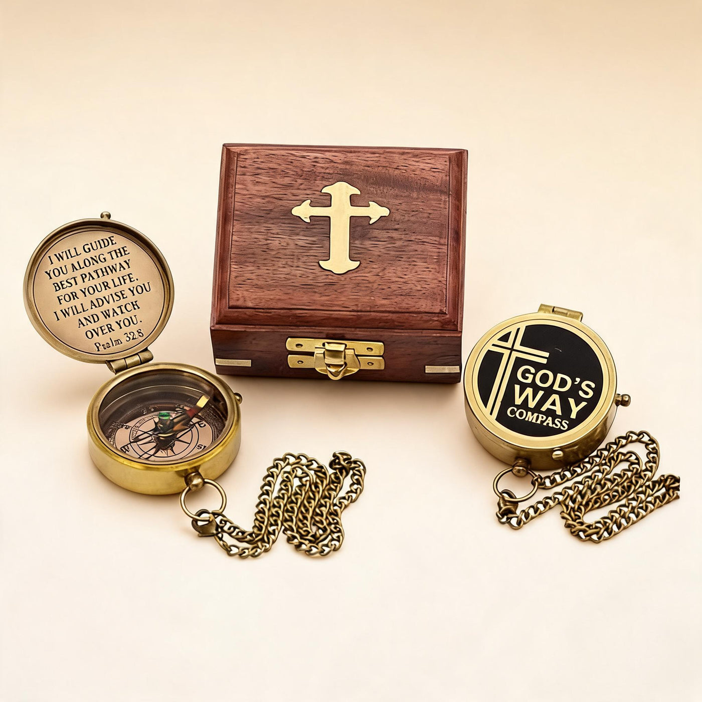 The Compass open with Psalm 32:8 engraving alongside closed compass and rosewood box with brass cross