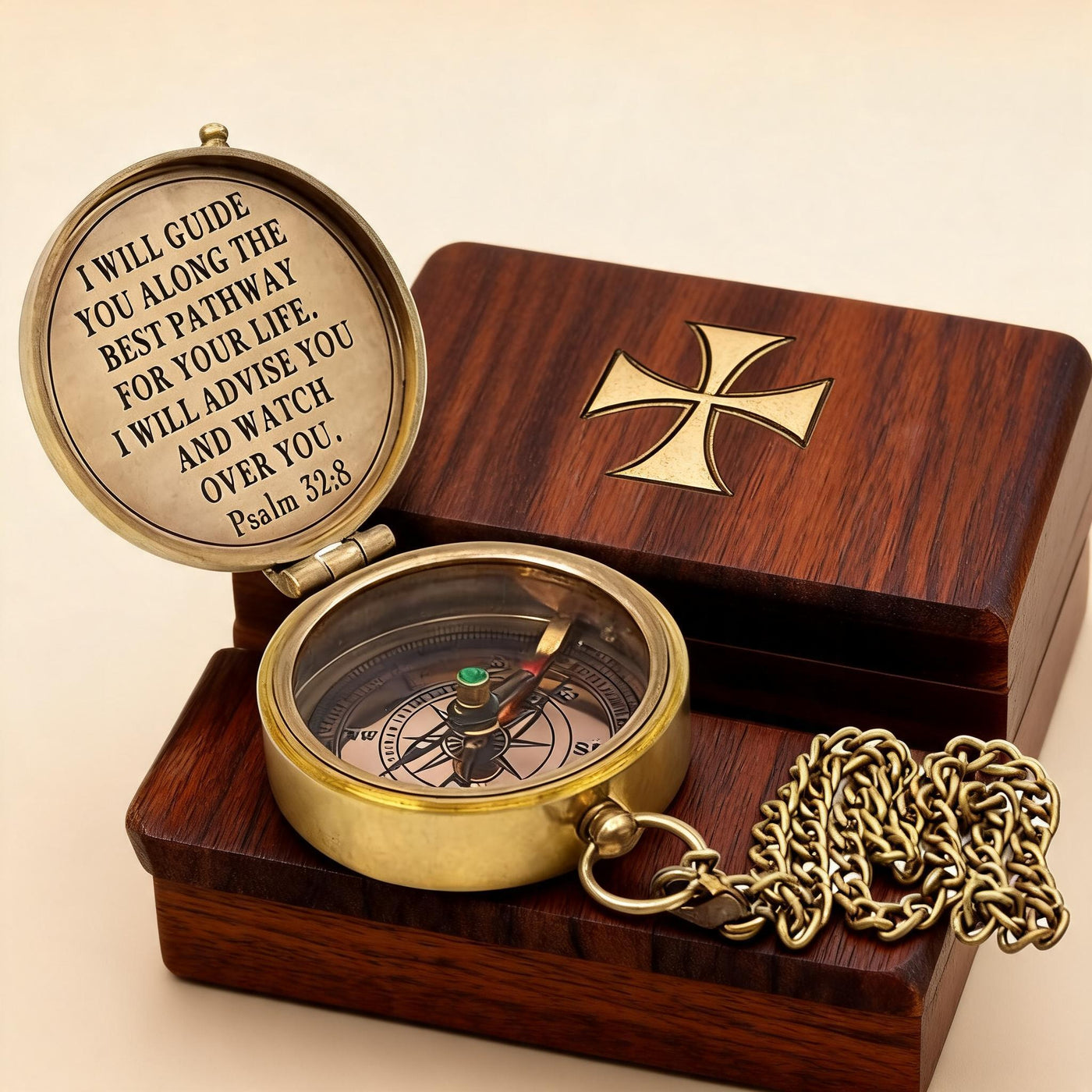 The Compass open showing hand-engraved Psalm 32:8 scripture with wooden box
