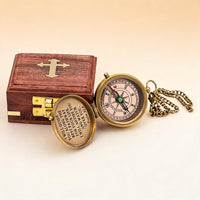 The Compass open showing compass rose and Psalm 32:8 engraving with wooden box and chain